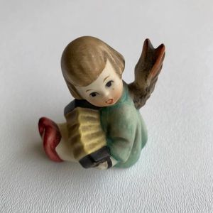 Hummel Angel joyous news with accordian candle holder